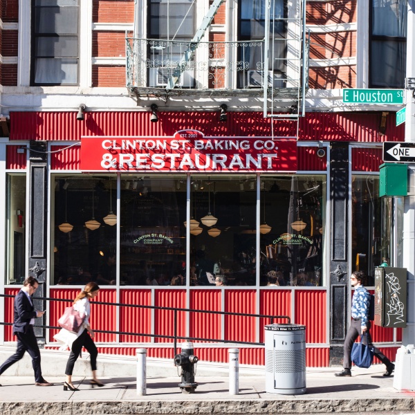 A view of the restaurant’s signature red exterior on East Houston. The sign says Clinton St. Baking Co. & Restaurant